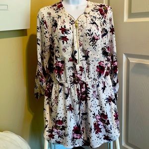 White shirt with purple floral patter